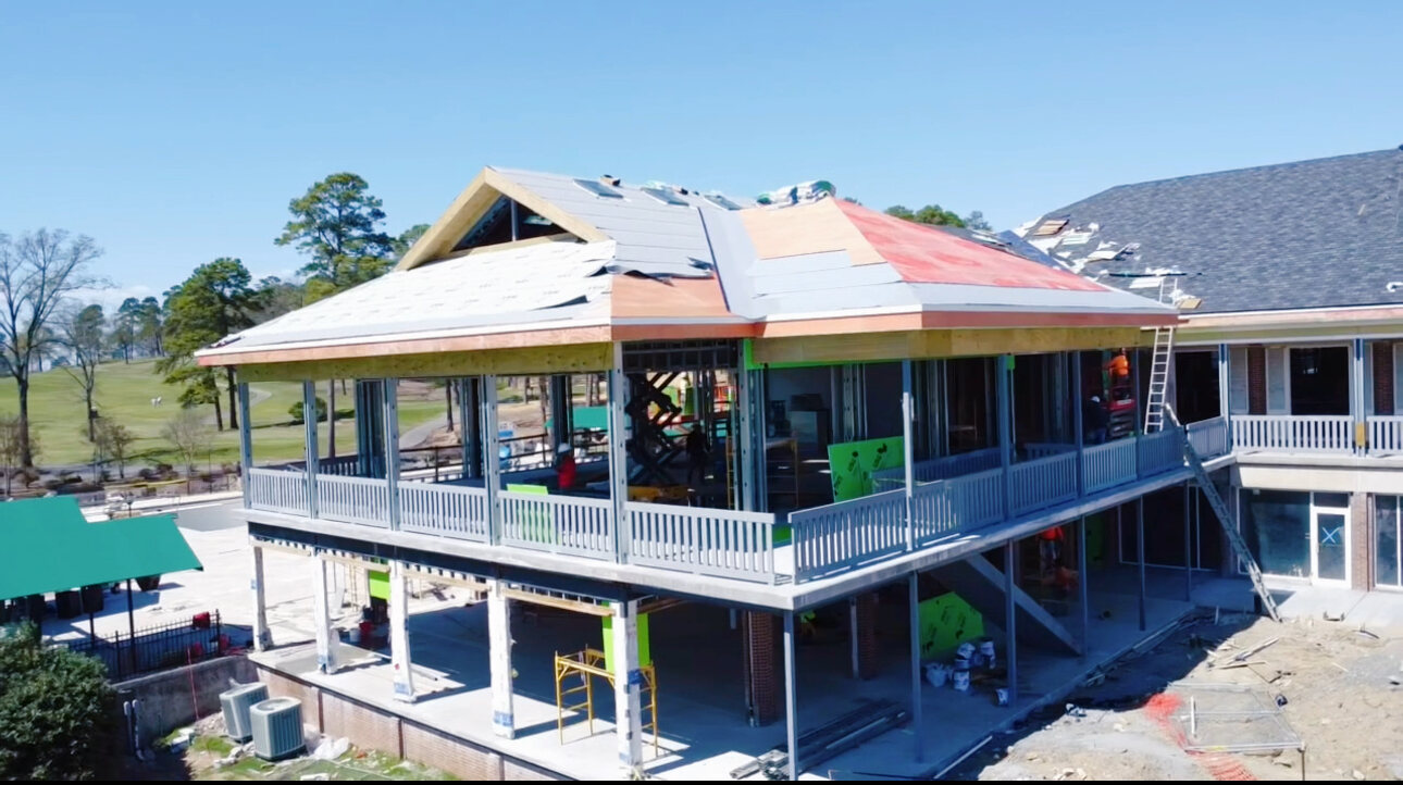 Aerial view of an active roof and building renovation